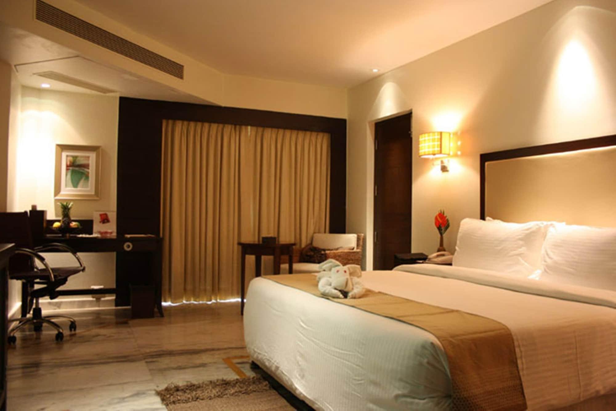 รอยัล ออร์คิด เซ็นทรัล กีรีติ Hotel ฮัมปี ภายนอก รูปภาพ